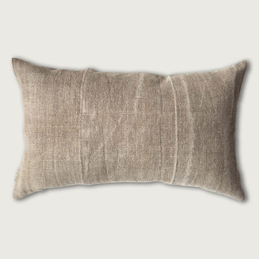 Textured rectangular pillow on a light gray background