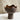 Ceramic bowl with wavy edge on a neutral background