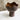 Ceramic vase with wavy top on a marble surface