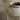 Speckled ceramic jar on a neutral background