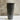 Textured ceramic vase on a neutral background