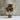 Ceramic vase with textured surface on a neutral background