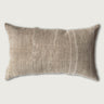 Textured rectangular pillow on a light gray background