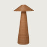 Wicker floor lamp with a cone-shaped base and woven shade on a white background